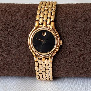 Movado black and gold ladies' watch.